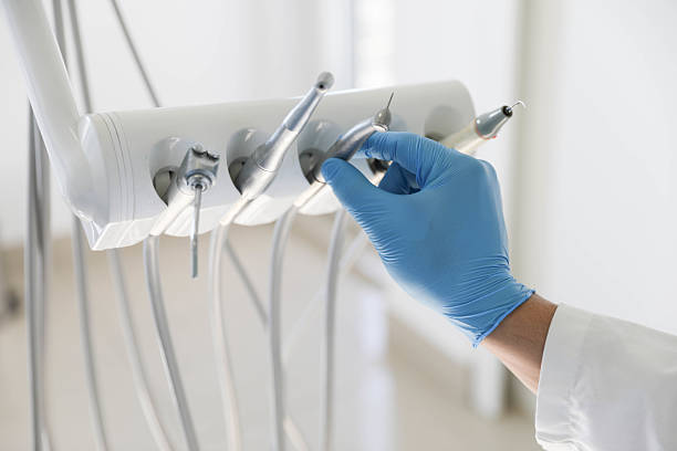 Professional Tooth Extraction technician working in Lane County County, KS
